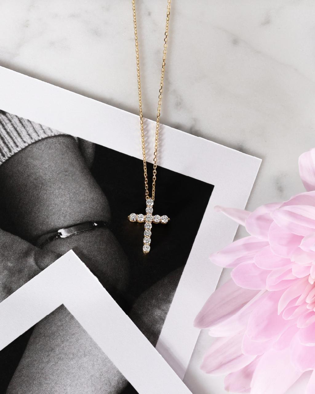 18ct yellow gold 11=0.25ct diamond cross necklace