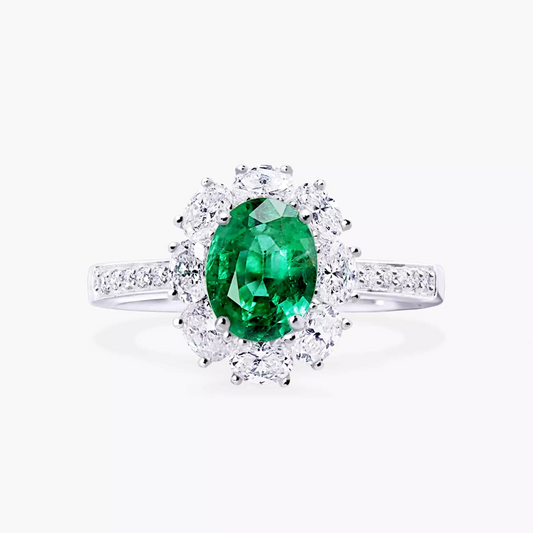 18ct white gold 1.12ct oval Emerald and round brilliant cut diamond halo ring