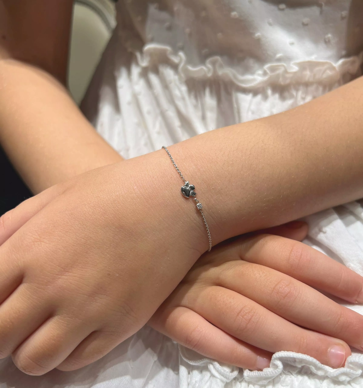 18ct white gold angel charm and diamond bracelet
