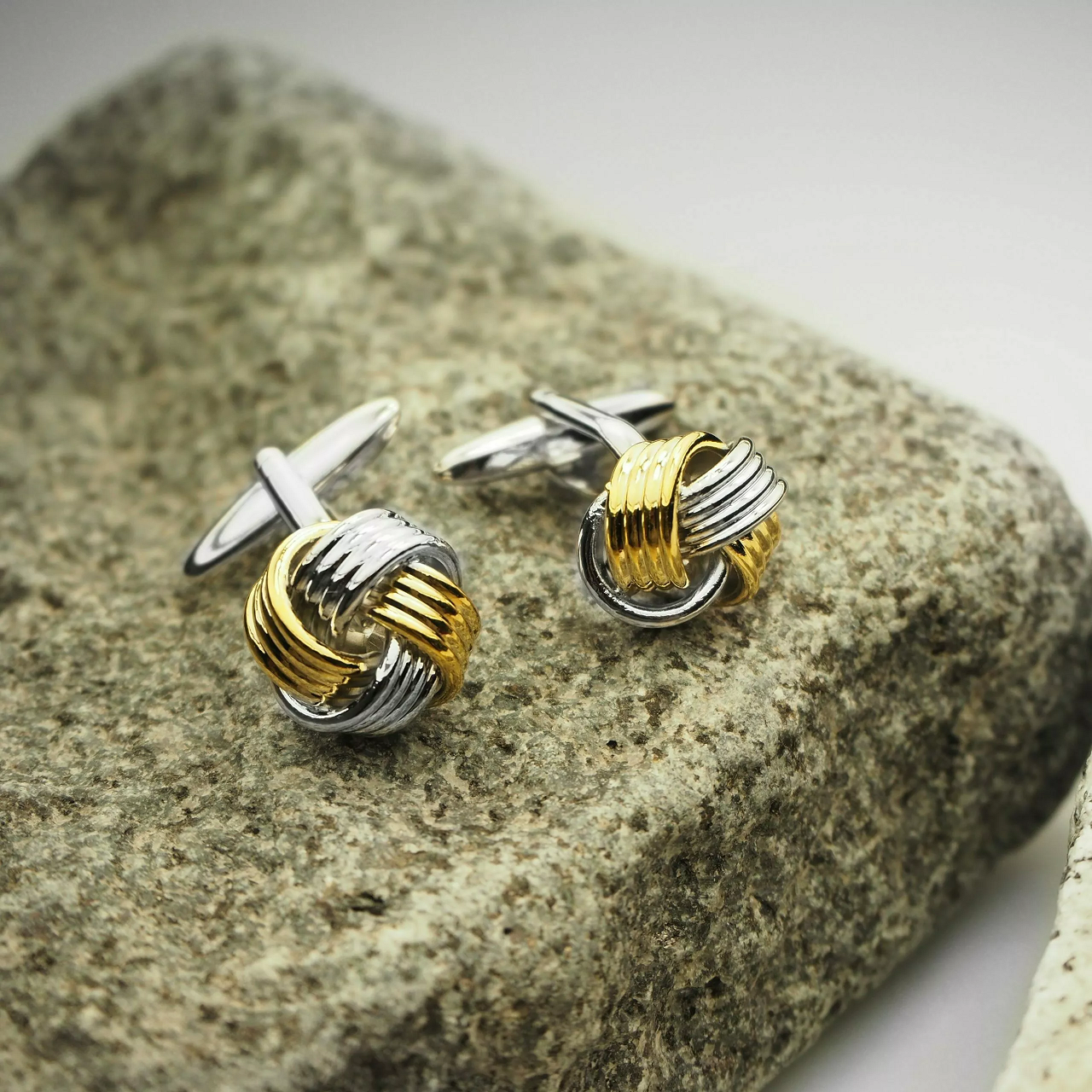 Yellow gold rhodium plated knot cufflinks