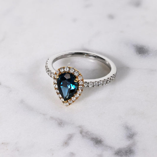 18ct white and yellow gold 1.51ct pear shape London blue topaz and diamond ring