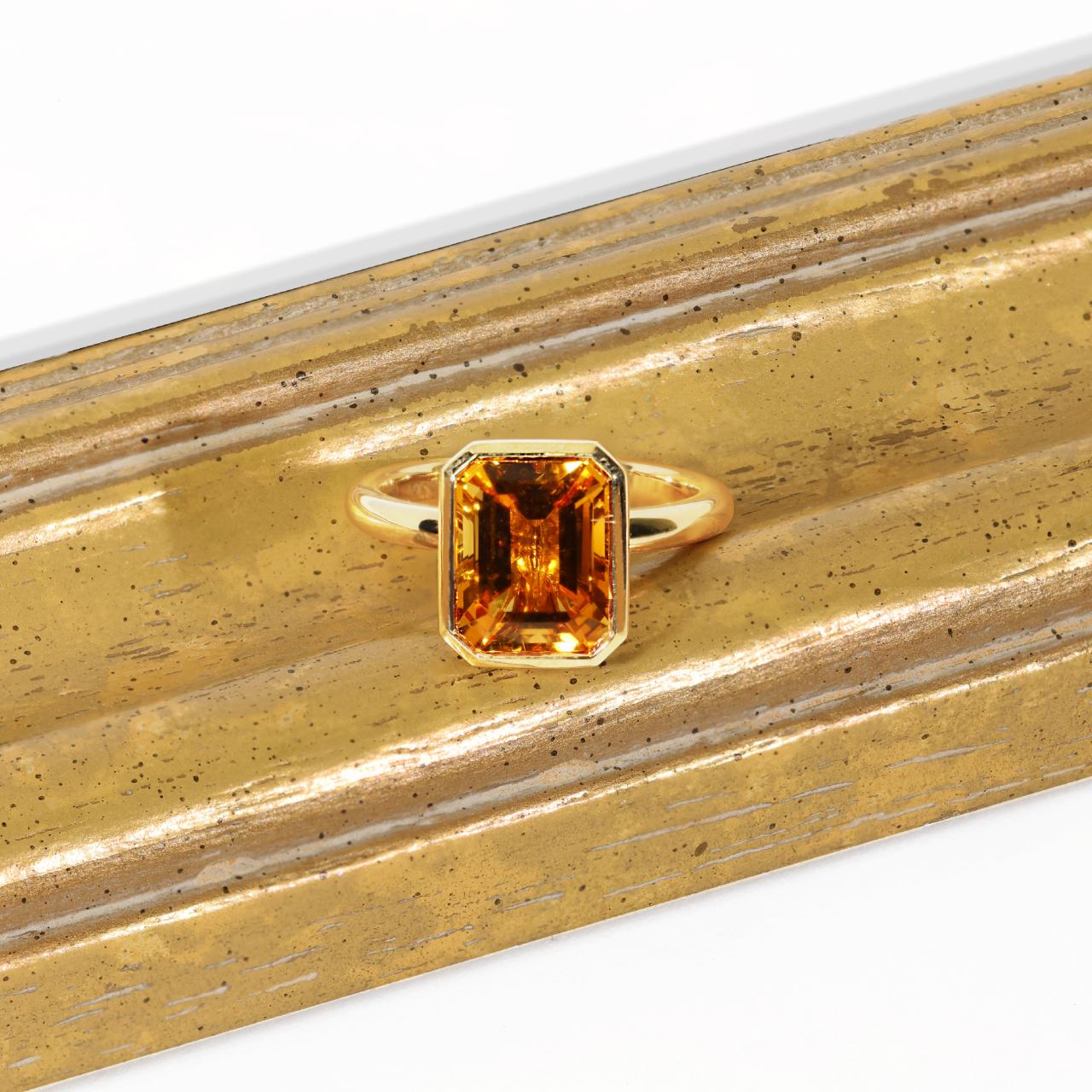 18ct yellow gold 2.98ct emerald cut citrine ring in bezel setting