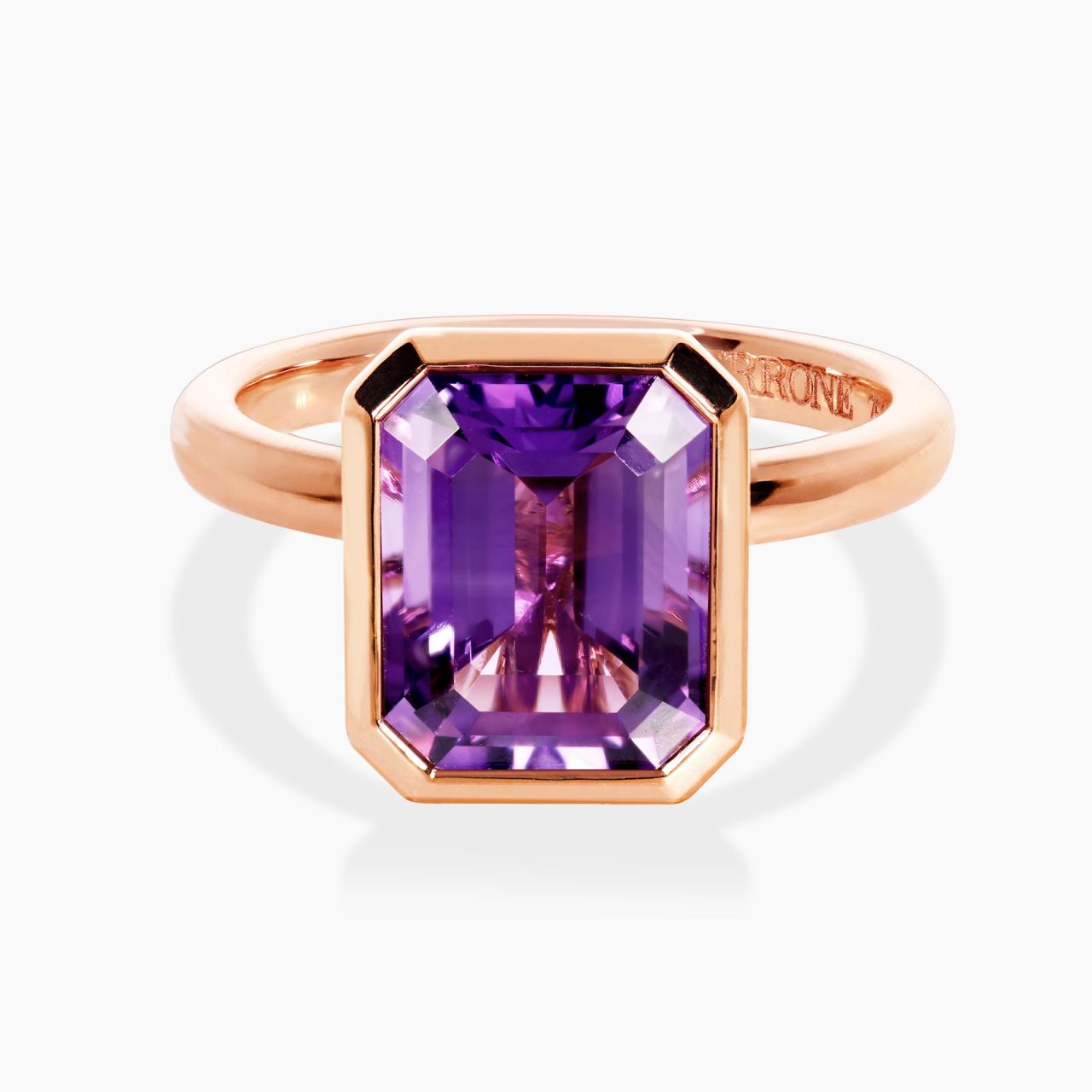 18ct rose gold 3.05ct emerald cut amethyst ring in a bezel setting