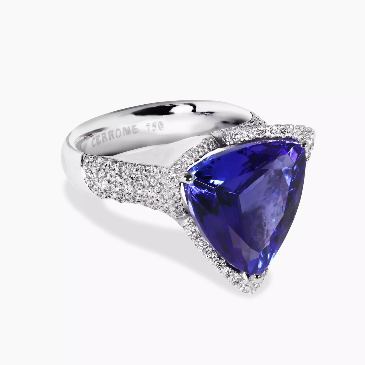 18ct white gold 8.09ct trilliant cut Tanzanite and pave set round brilliant cut diamond ring
