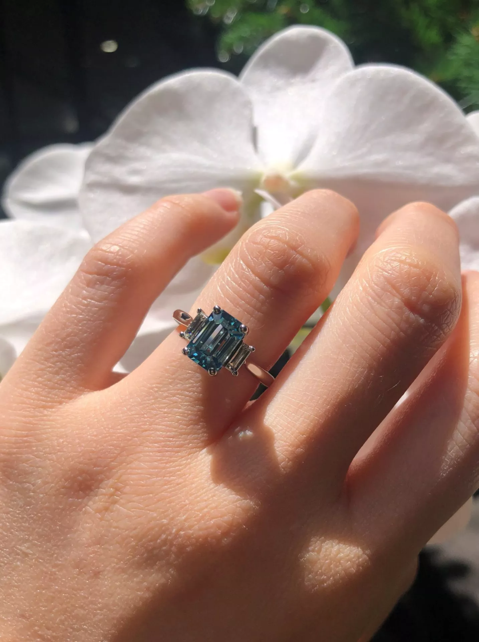 Platinum 3.33ct blue zircon emerald cut and baguette diamond ring