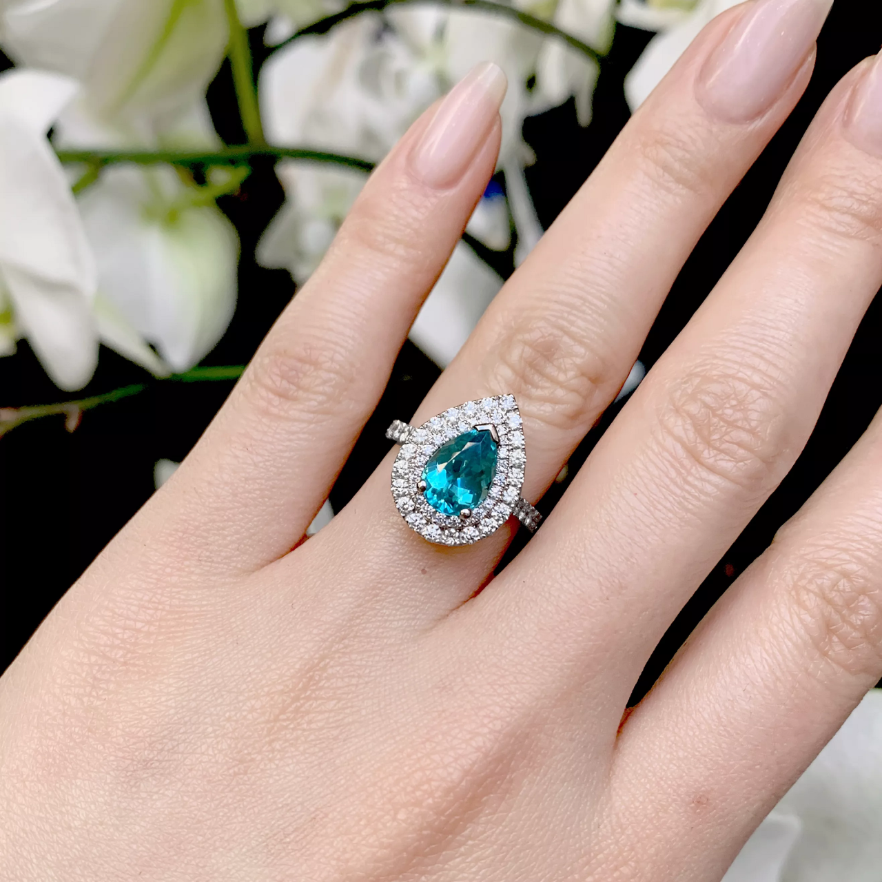 18ct white gold 1.90ct Pear shaped Paraiba tourmaline and round brilliant cut diamond double halo ring