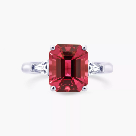 Platinum 4.42ct emerald cut pink tourmaline and tapered baguette diamond ring