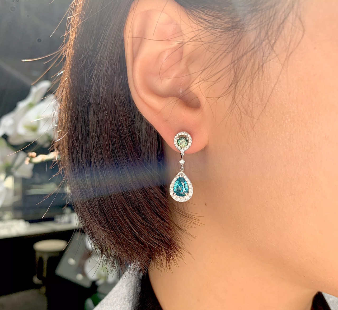 18ct white gold blue zircon, teal sapphire and diamond drop earrings