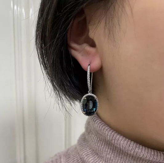 18ct white and rose gold oval London blue topaz and diamond drop earrings
