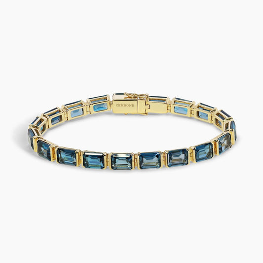 18ct yellow gold emerald cut London blue topaz bracelet