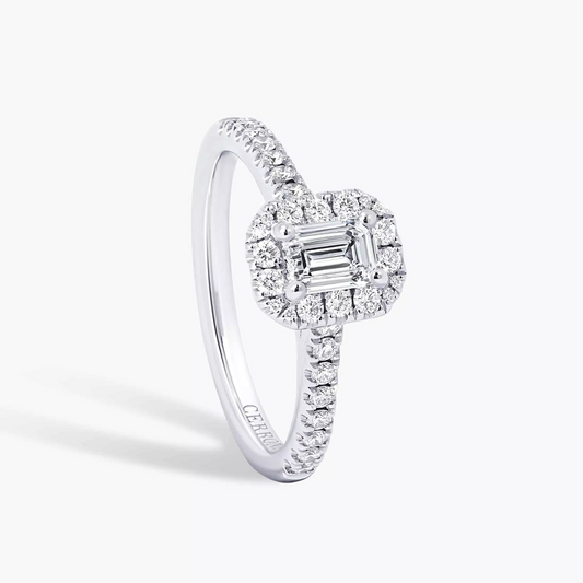 18ct white gold 0.50ct E VS1 emerald and round brilliant cut diamond halo ring