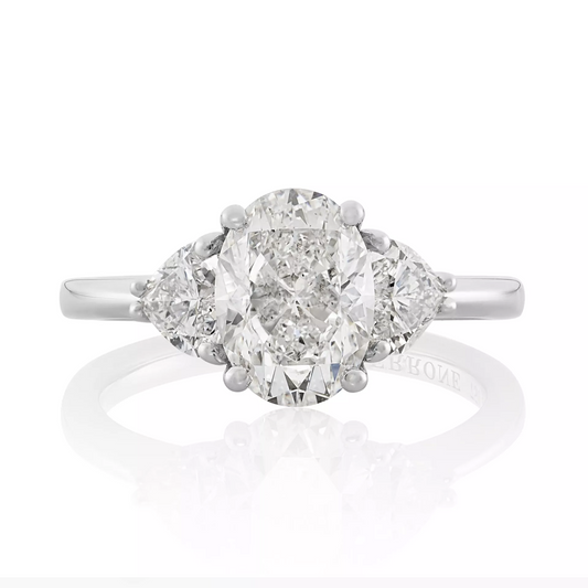 TRE ANIME - 18ct white gold oval and heart shaped diamond trilogy ring