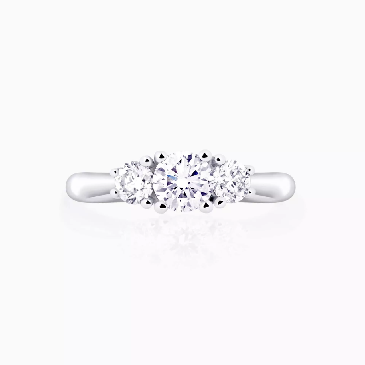 Platinum F SI round brilliant cut diamond trilogy ring
