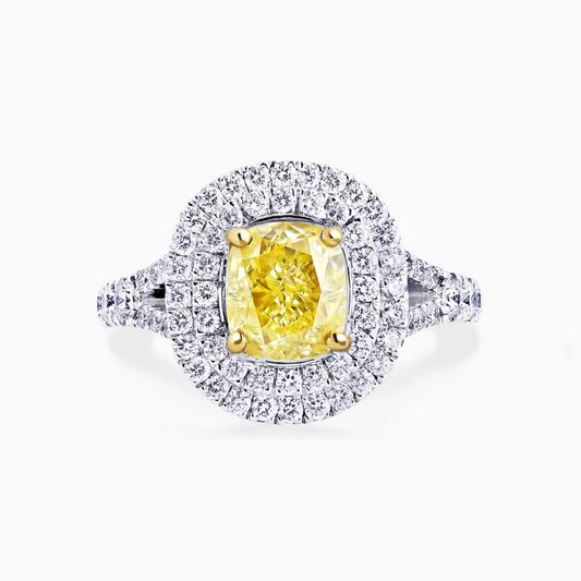 18ct white and yellow gold cushion cut fancy intense yellow diamond and round brilliant cut pave set split band diamond ring