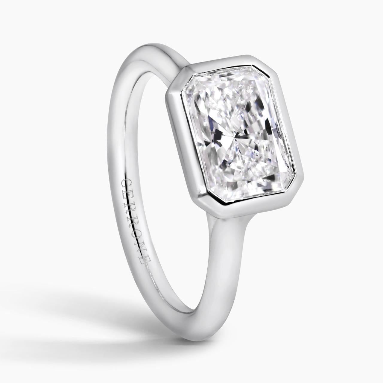 18ct white gold elongated radiant cut lab grown diamond bezel set solitaire ring
