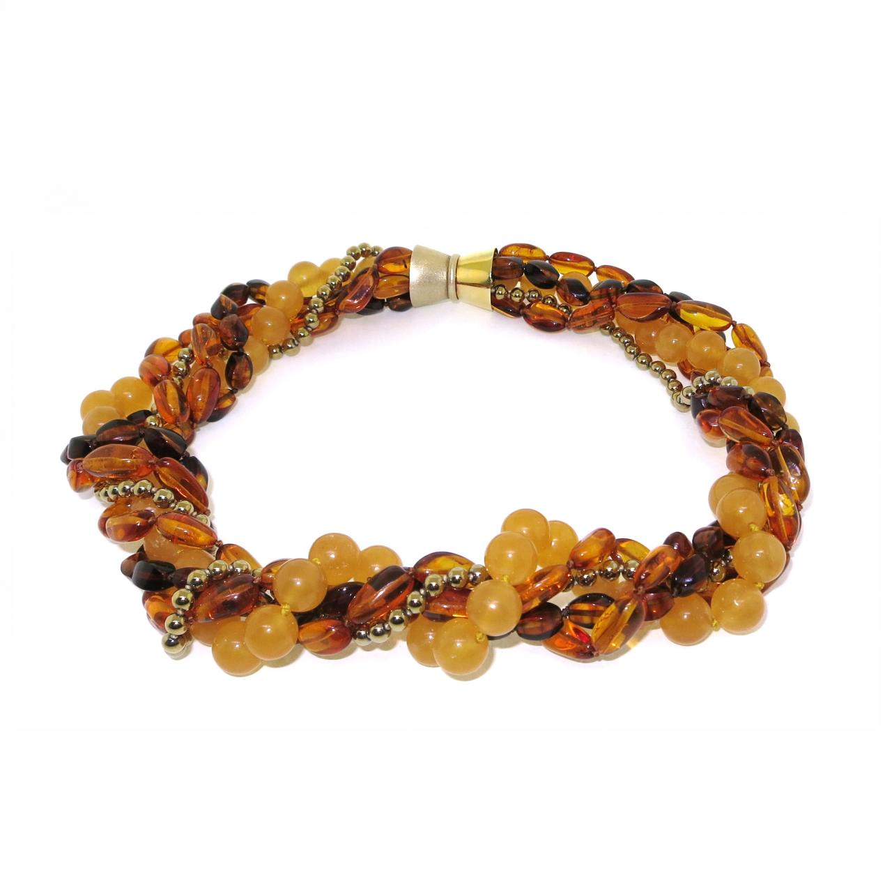 Amber, single row of gold plated hemitite and single row of orange calcite beaded necklace