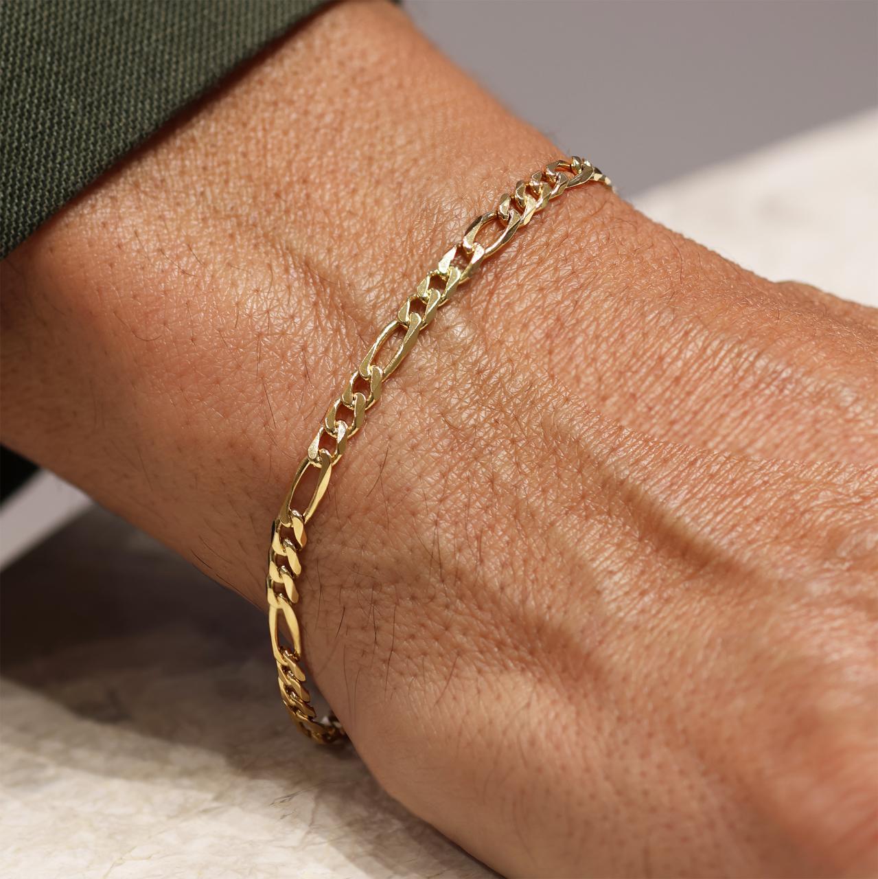 18ct yellow gold 21cm figaro link bracelet with parrot clasp