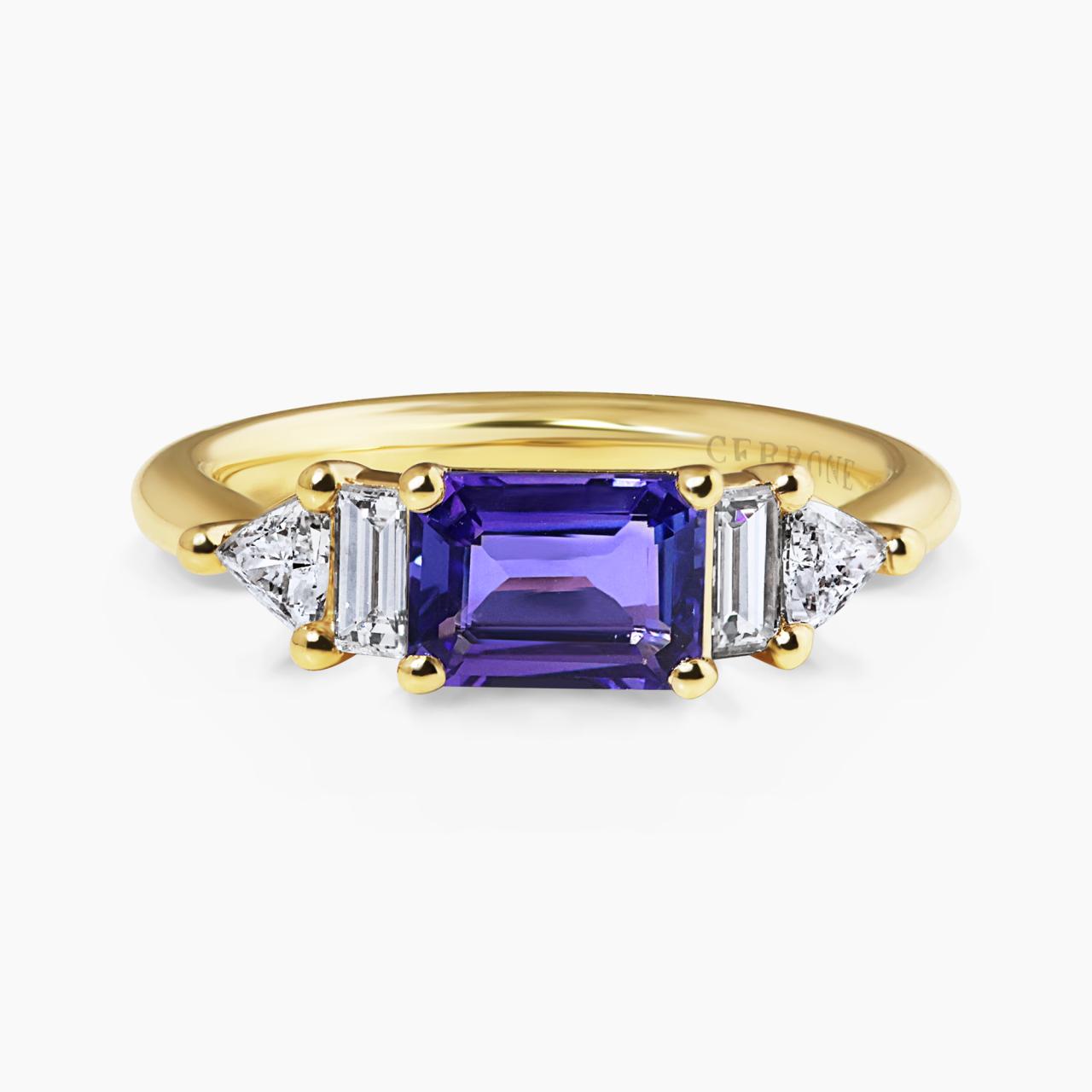 18ct yellow gold 0.96ct emerald cut tanzanite, baguette and trilliant cut diamonds ring
