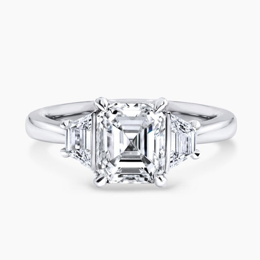 EVELINA - Platinum emerald cut and trapezoid step cut diamond ring