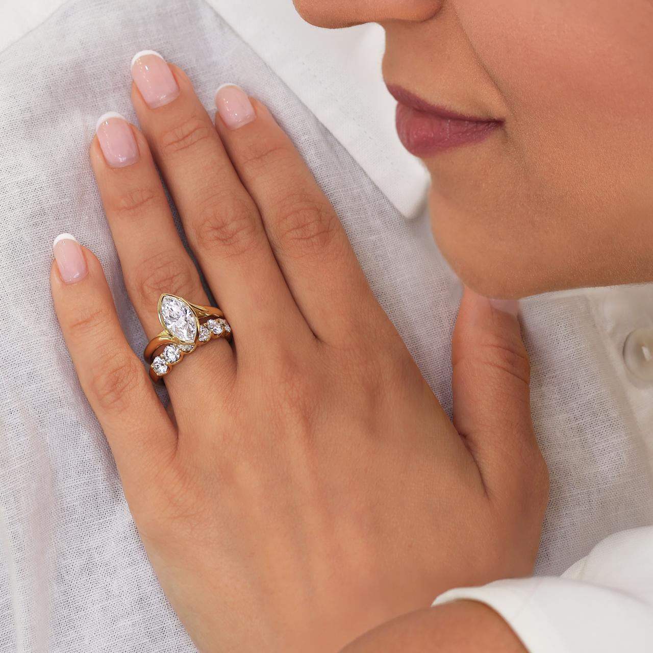 18ct yellow gold 1.75ct marquise cut LAB Grown Diamond solitaire ring in a bezel setting