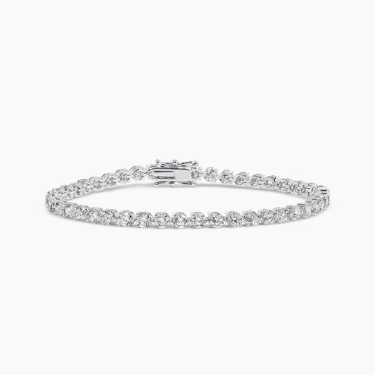 18ct white gold 6.54ct round brilliant cut diamond tennis bracelet in a three claw setting