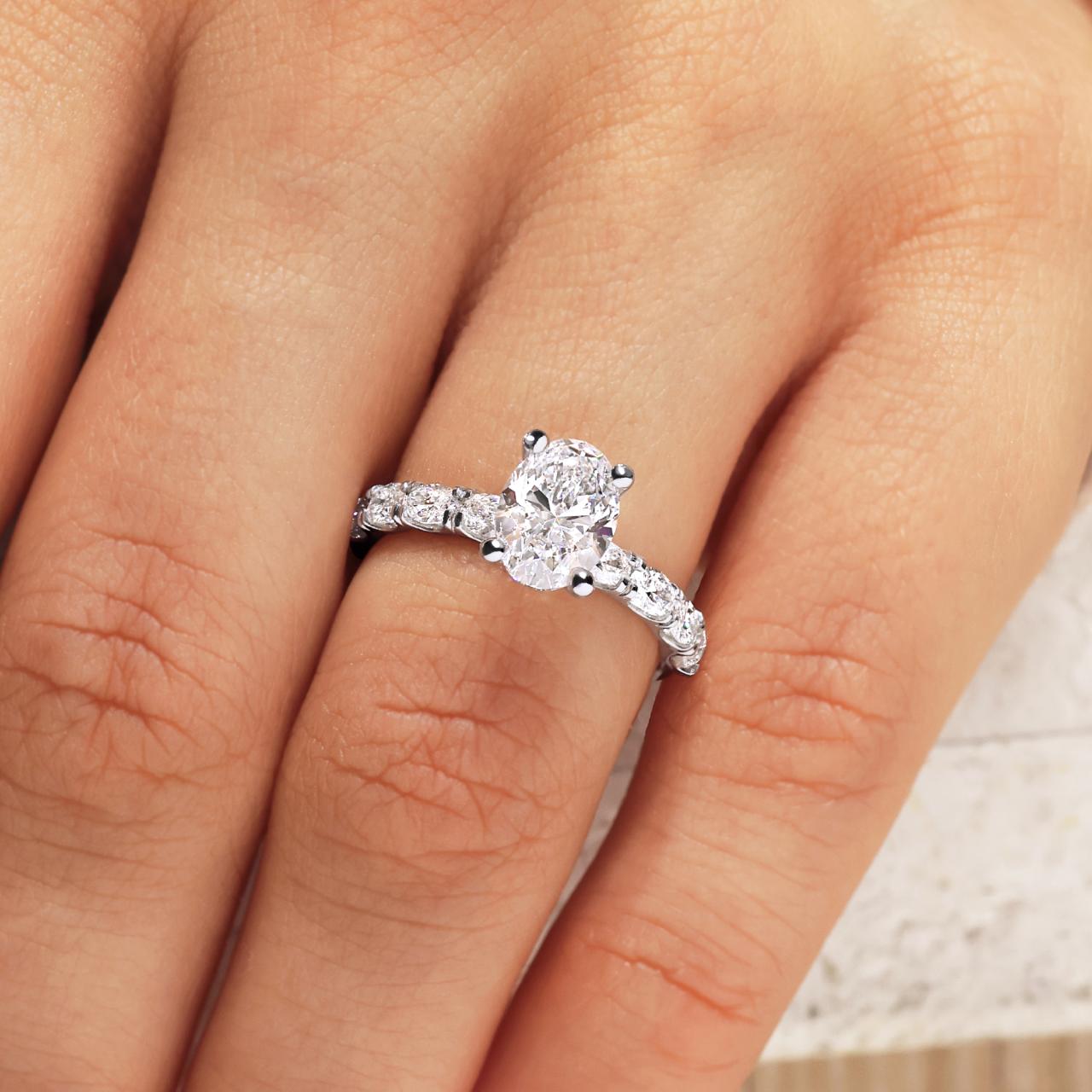 Platinum 1.51ct oval brilliant cut diamond ring in four claw setting