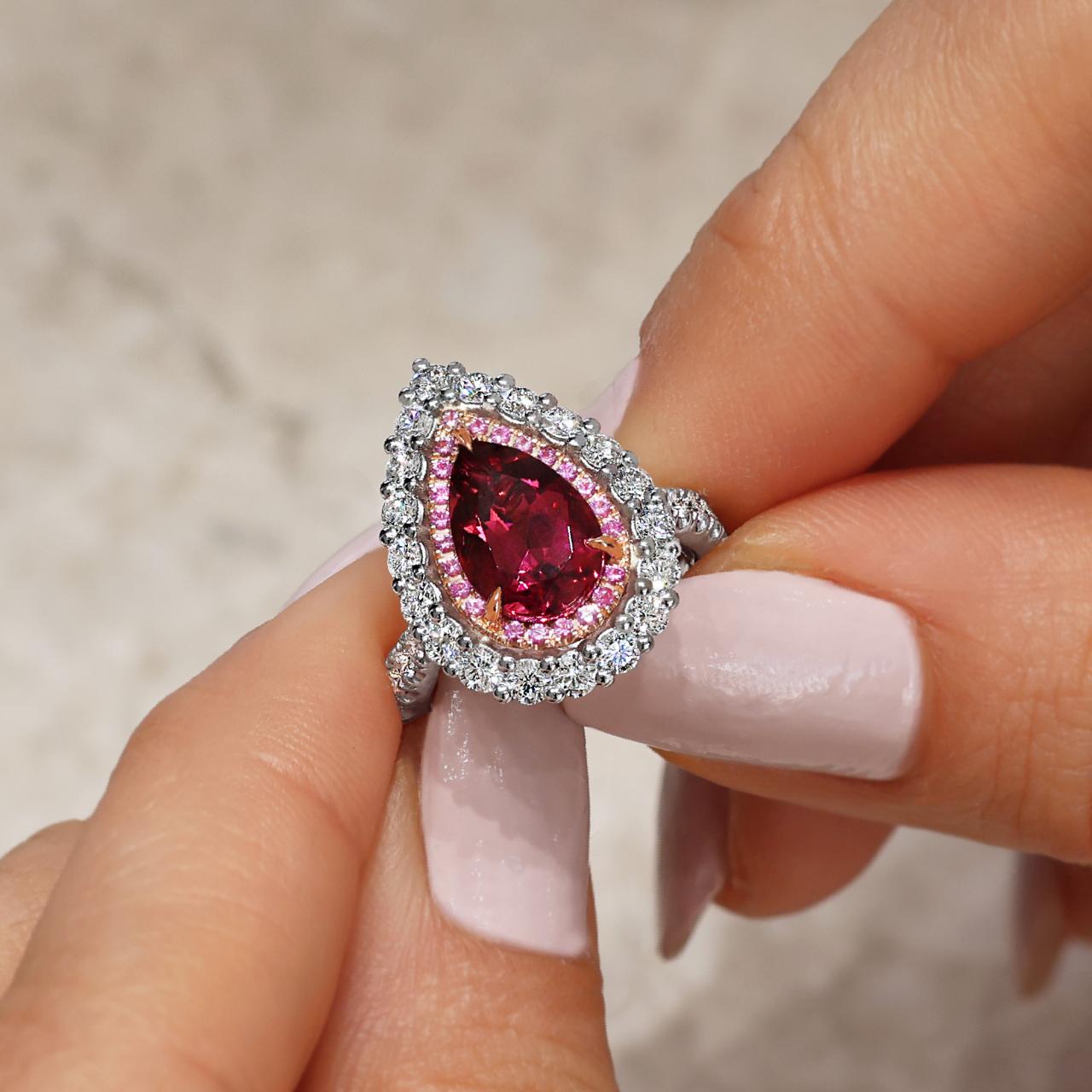 18ct rose gold and platinum 1.90ct pear shaped rubelite, pink sapphires and diamond ring