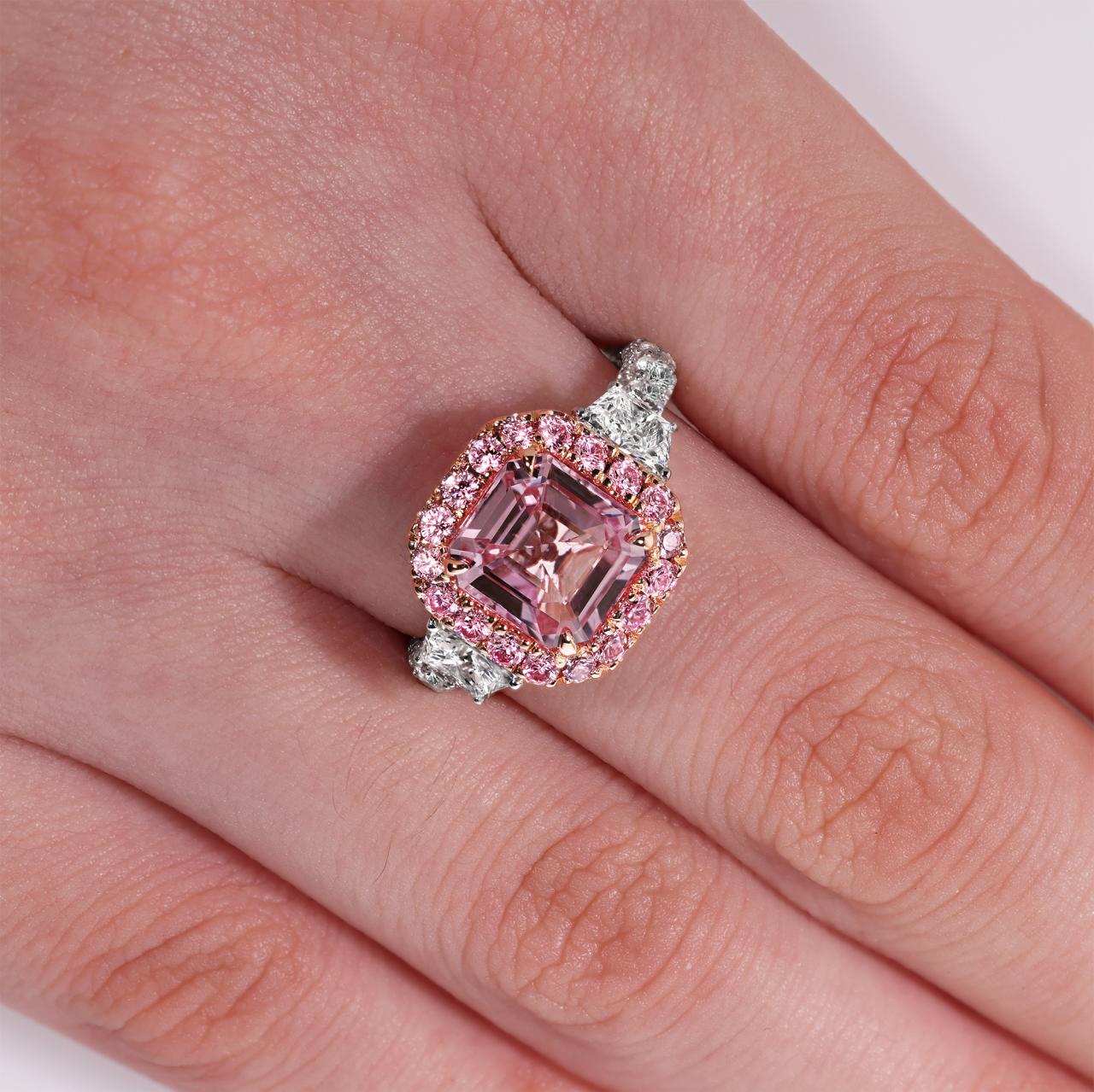 Platinum and 18ct rose gold octagonal step cut natural pink Madagascan Padparadscha unheated sapphire and Argyle Pink diamond ring on the finger