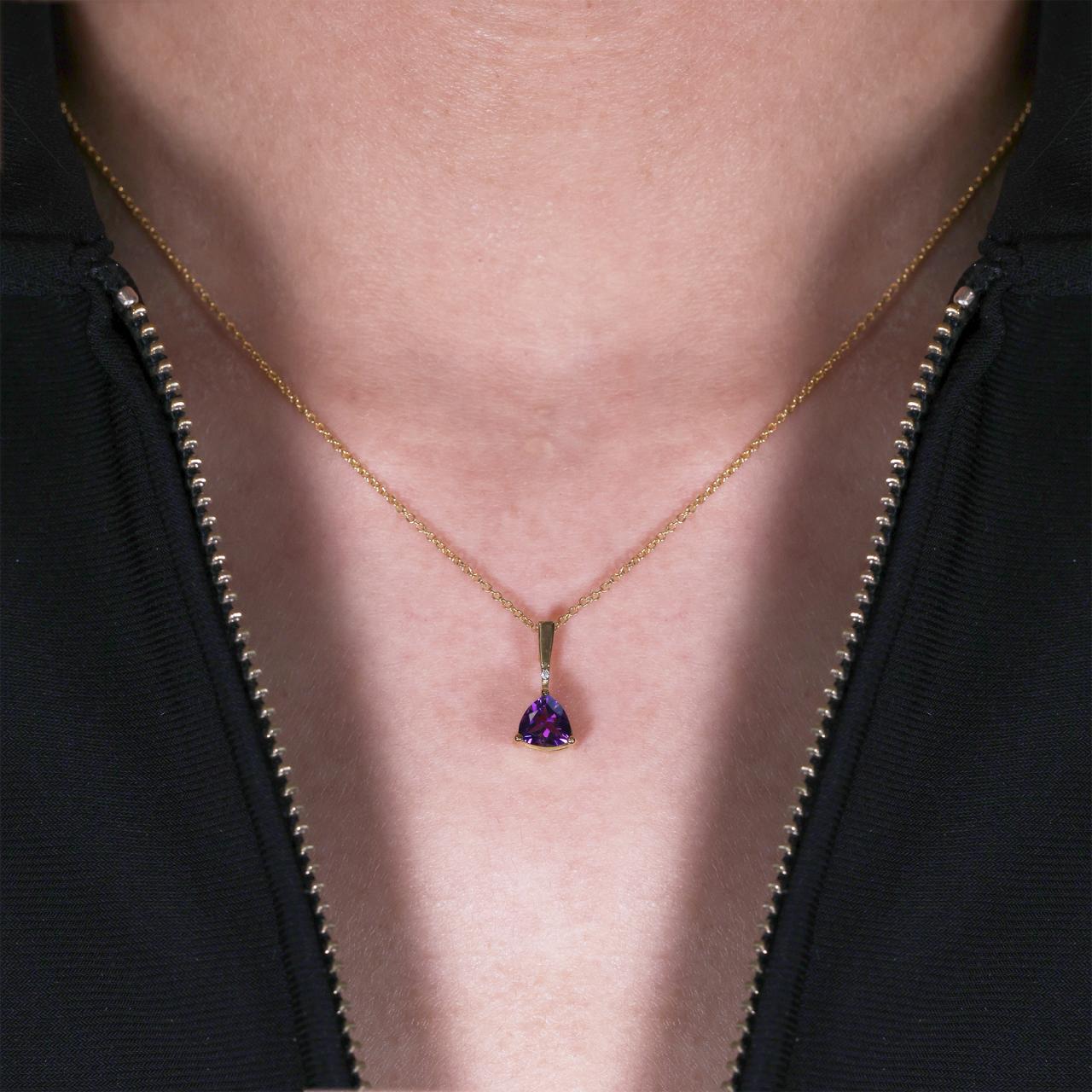18ct yellow gold triangle amethyst and diamond necklace on the neck