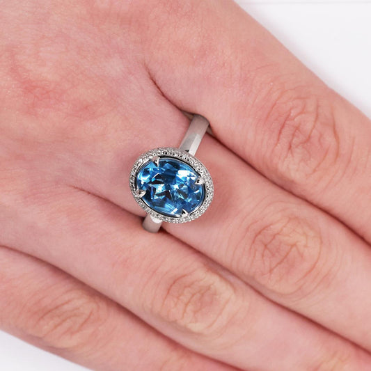 18ct white gold 3.22ct oval Swiss blue topaz and diamond ring