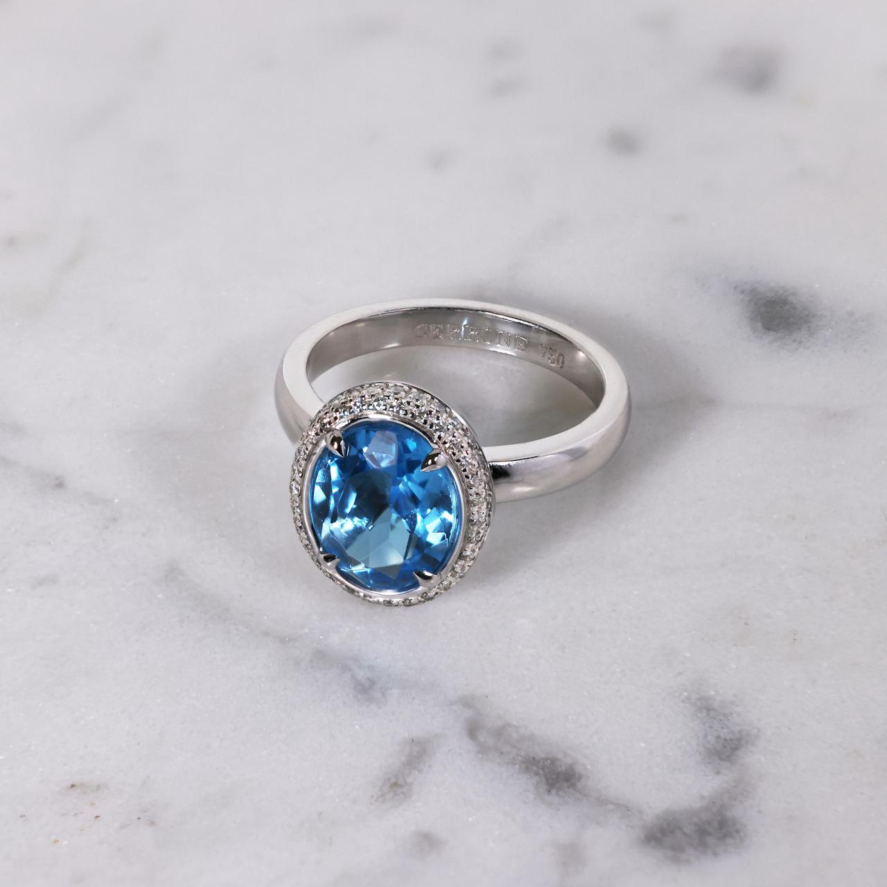 18ct white gold 3.22ct oval Swiss blue topaz and diamond ring