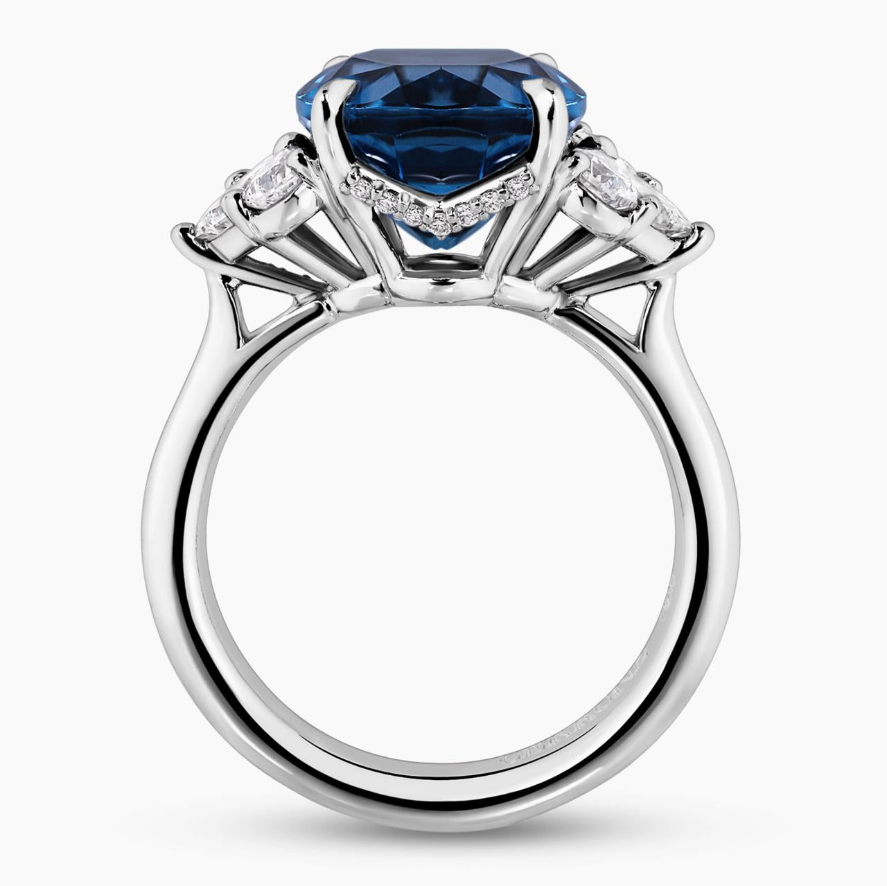 18ct white gold 6.09ct oval shape London blue topaz and diamond ring with pear, princess and round brilliant cut diamonds