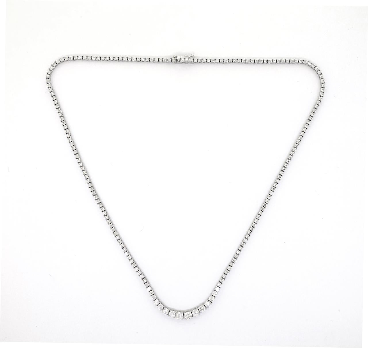 18ct white gold graduating round brilliant cut diamond tennis necklace in a four claw setting