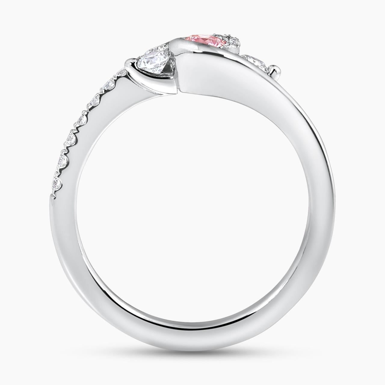 18ct white gold 0.14ct RBC Argyle Pink Diamond and RBC diamonds surrounding on a twist setting