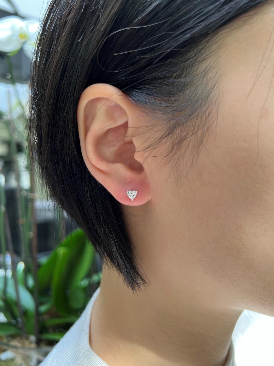 18ct white gold 2=0.62ct heart shaped diamond stud earrings in a claw setting