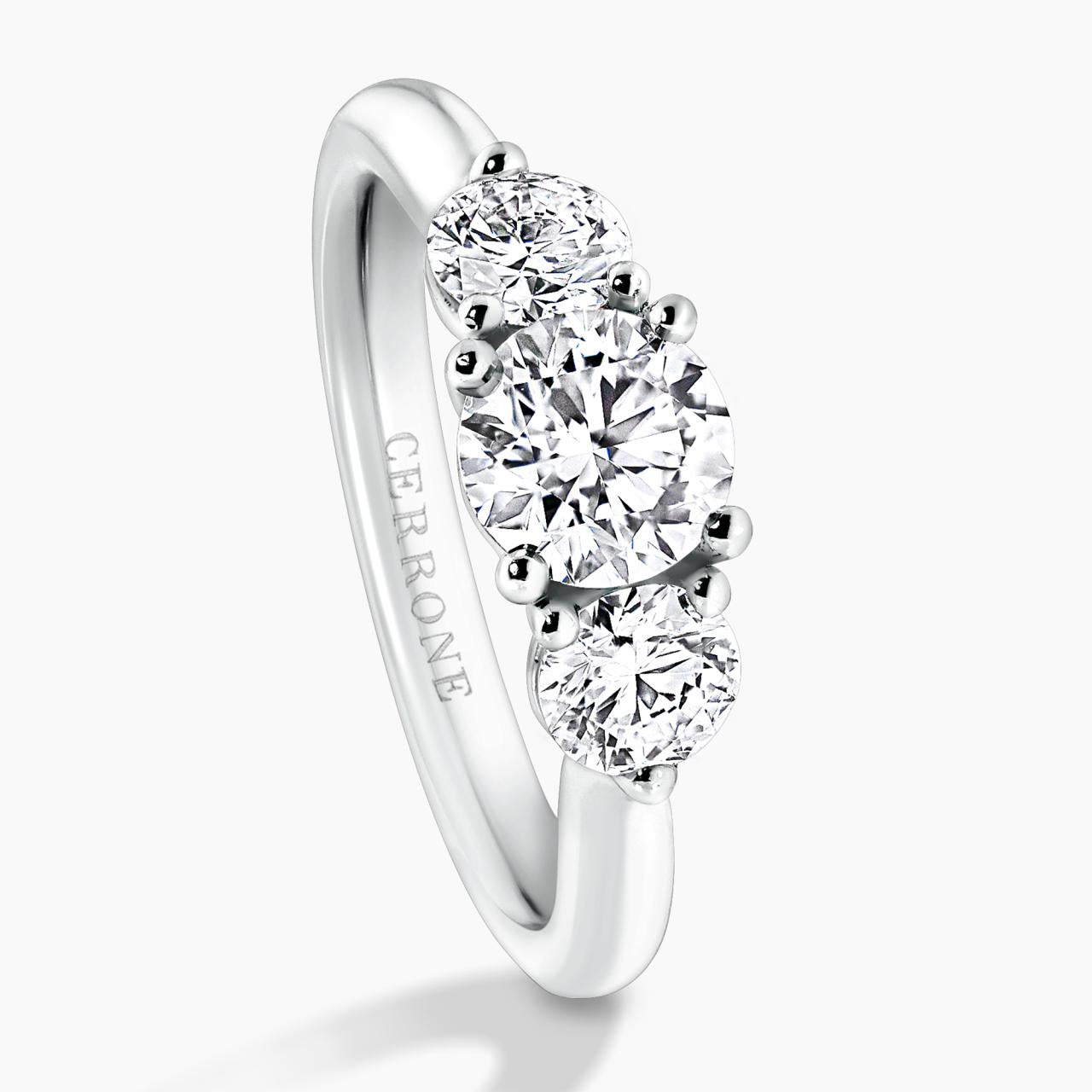 18ct white gold 0.80ct Round brilliant cut diamond ring with 2=0.62ct round brilliant cut diamonds on the side
