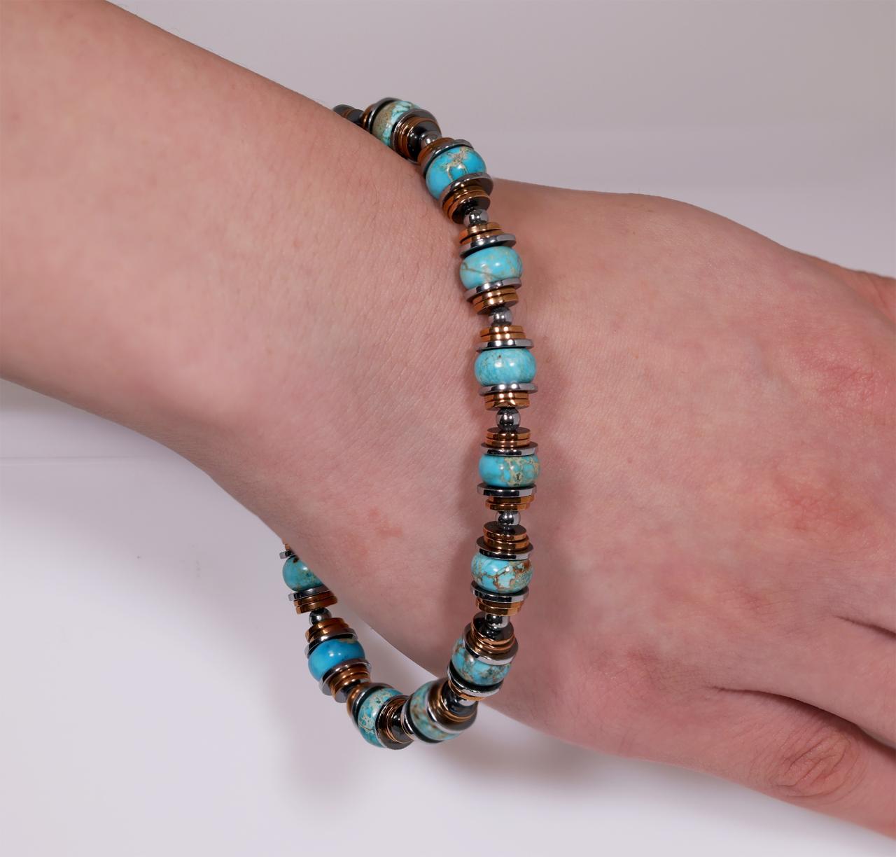 Turquoise and hematite beads bracelet with gold plated silver fittings from the Carmela Cerrone Collection