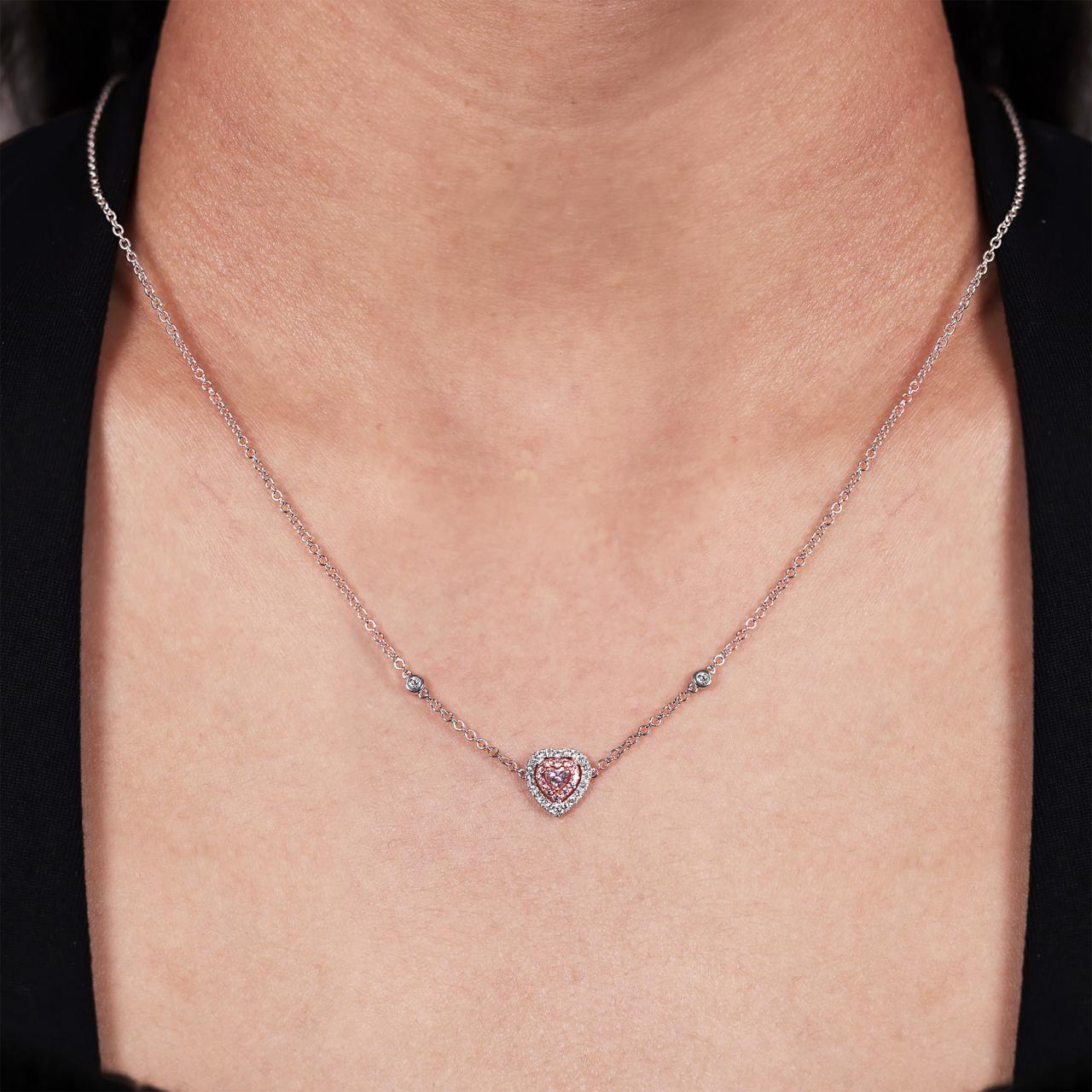 18ct white and rose gold pink and white diamond heart necklace on the neck