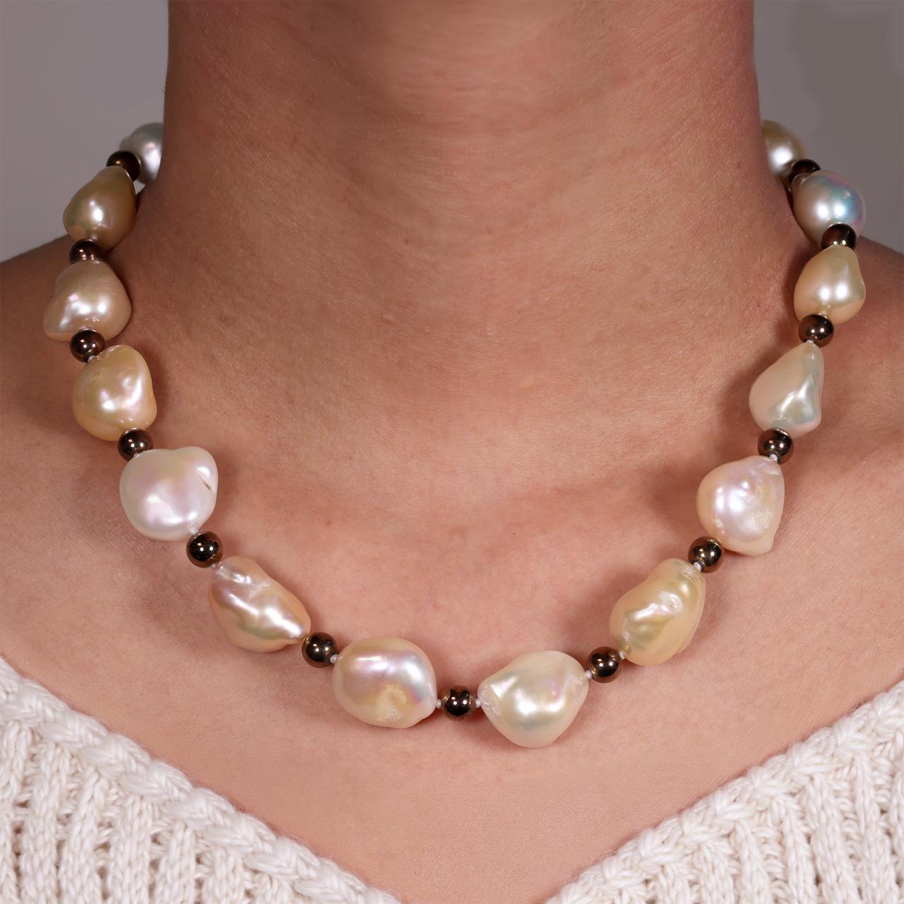Single row of 15mm AAA baroque fresh water pearls and 6mm bronze plated hematite necklace with gold plated oval silver magnetic clasp