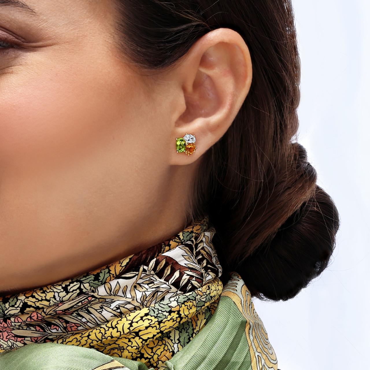 18ct white gold Oval Peridot, Heart Citrines and Oval Diamond stud earrings on the ear