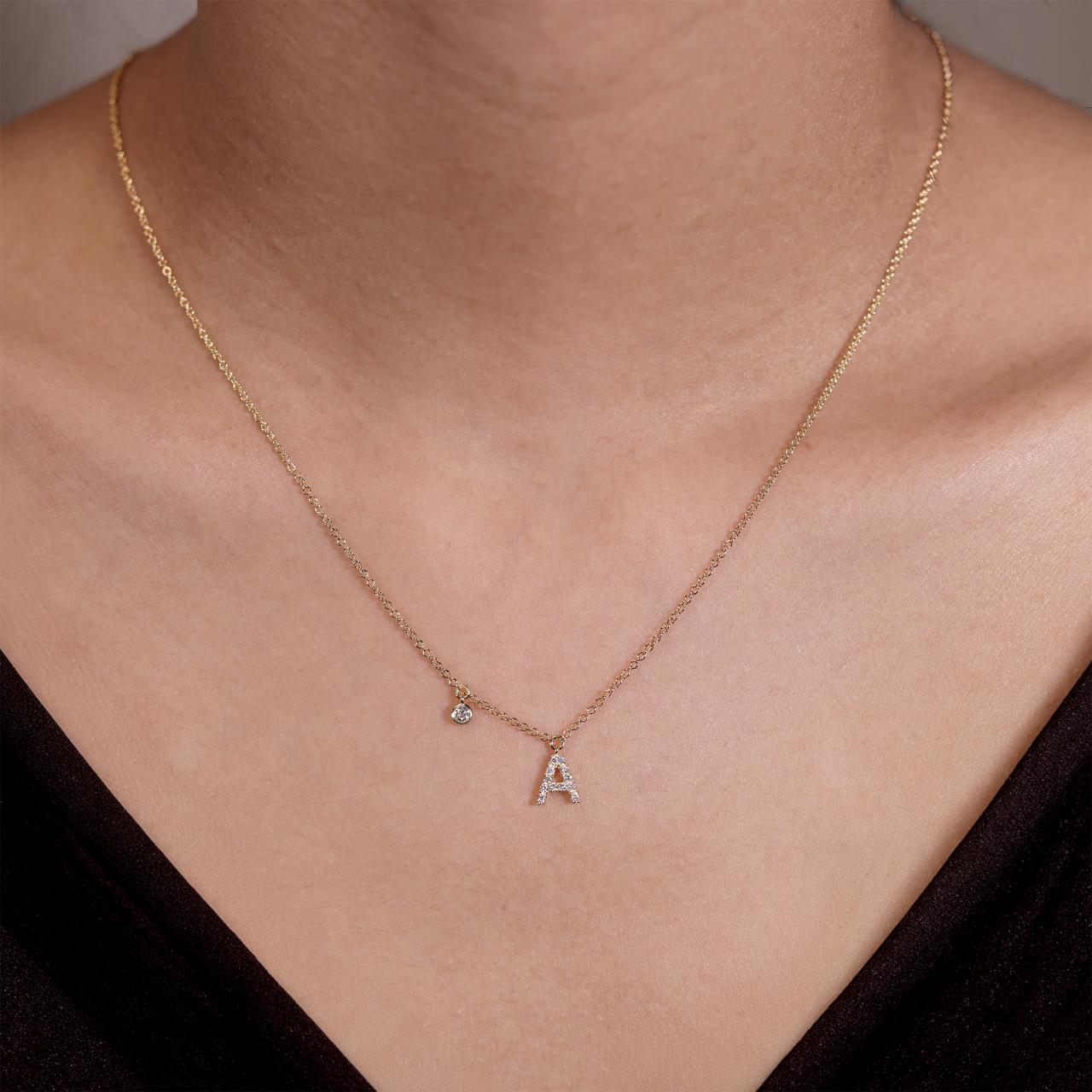 18ct yellow gold diamond initial "A" necklace with bezel diamond