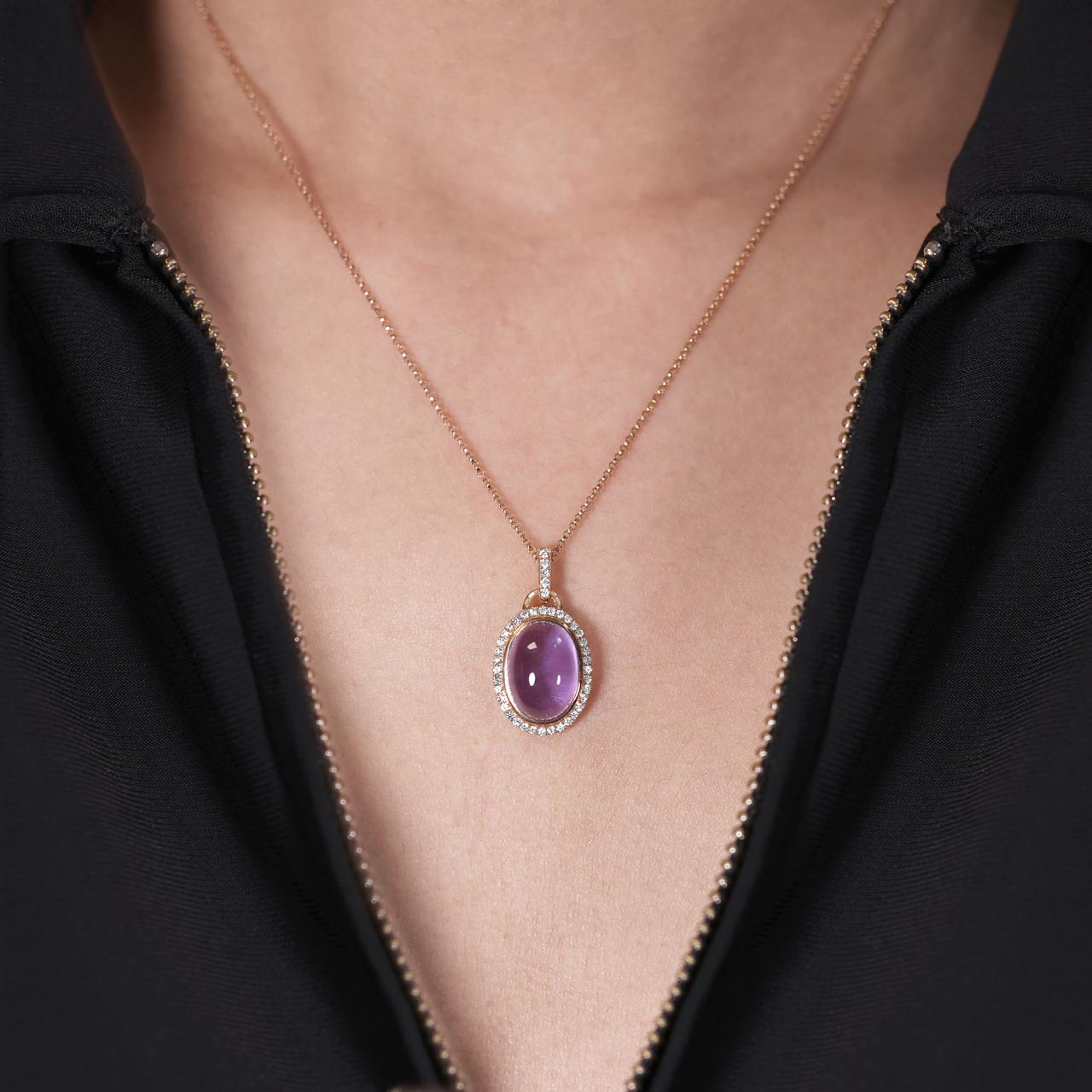 18ct rose gold amethyst & diamond set oval pendant on the neck