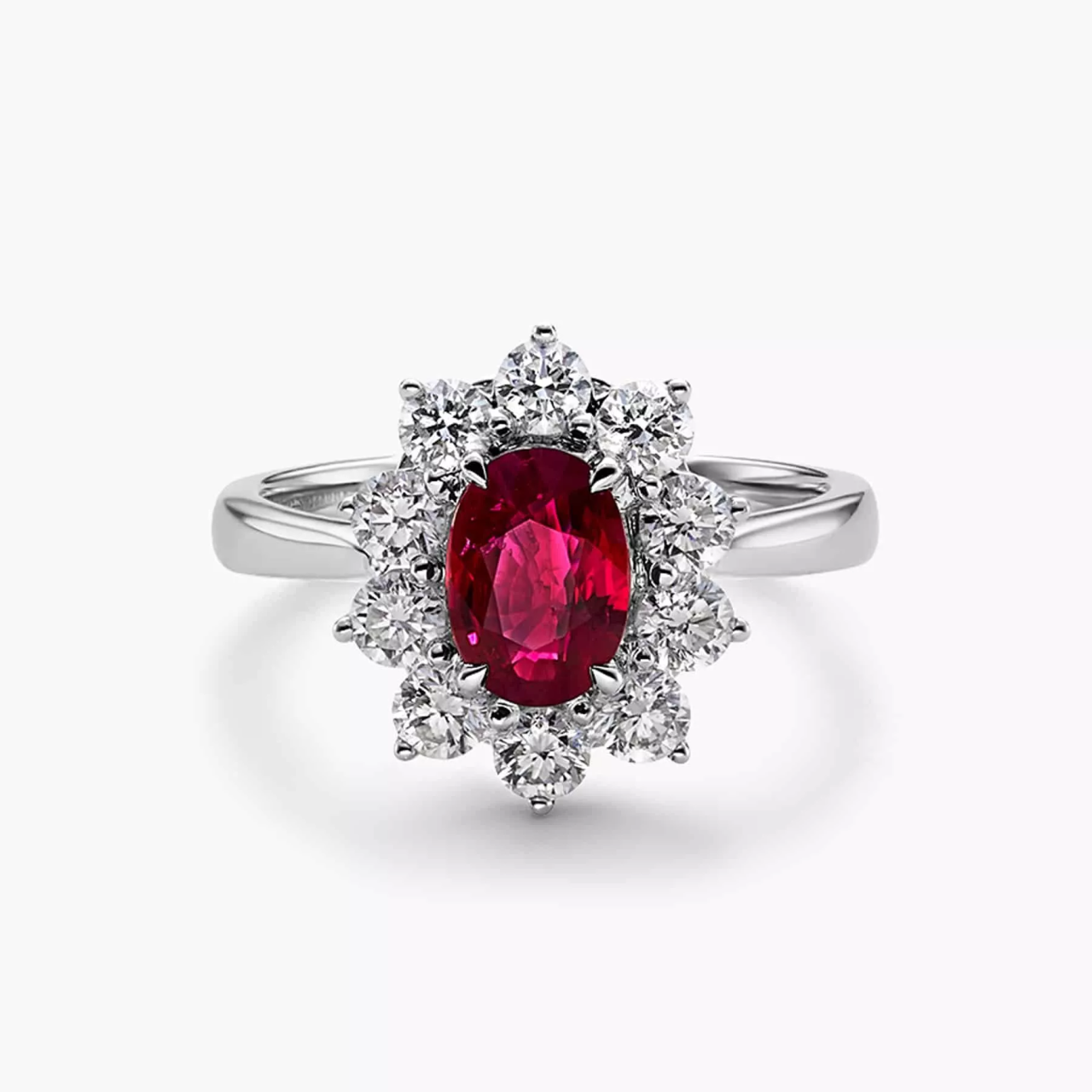 18ct white gold 1.02ct oval ruby and round brilliant cut diamond halo ring
