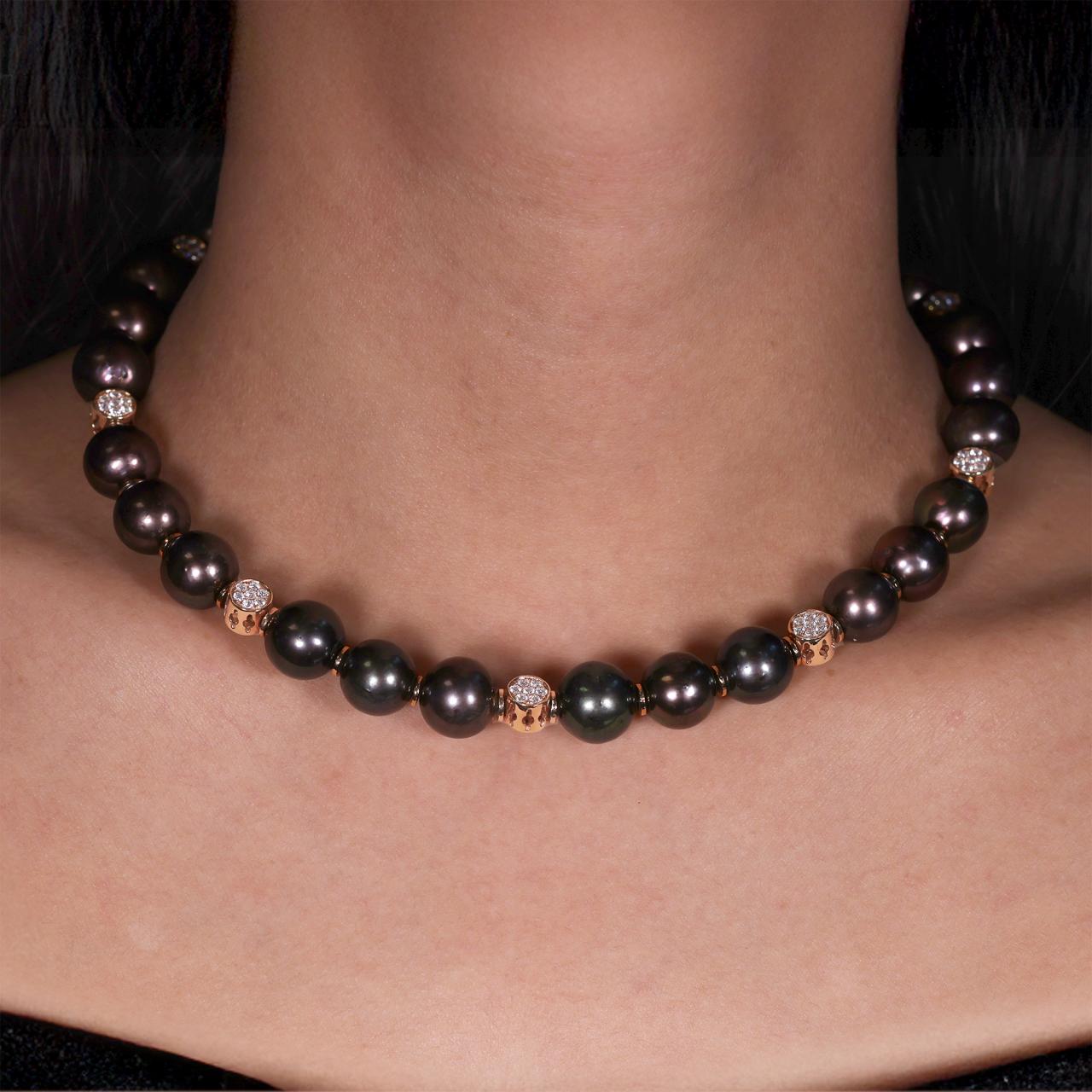 18ct Rose Gold Diamond and Fresh Water Black Pearl Necklace from the Carmela Cerrone Collection on the neck