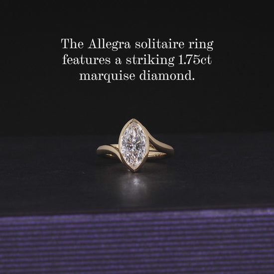 18ct yellow gold marquise cut LAB Grown Diamond solitaire engagement ring in a bezel setting
