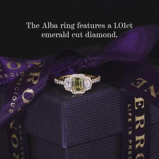 18ct yellow gold Fancy Intense Yellow emerald cut diamond engagement ring with cadillac step cut diamonds on the side