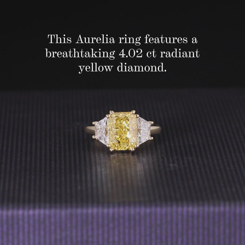 18ct yellow gold Fancy Vivid Yellow radiant LAB Grown diamond engagement ring with trapezoid Lab Grown diamonds 