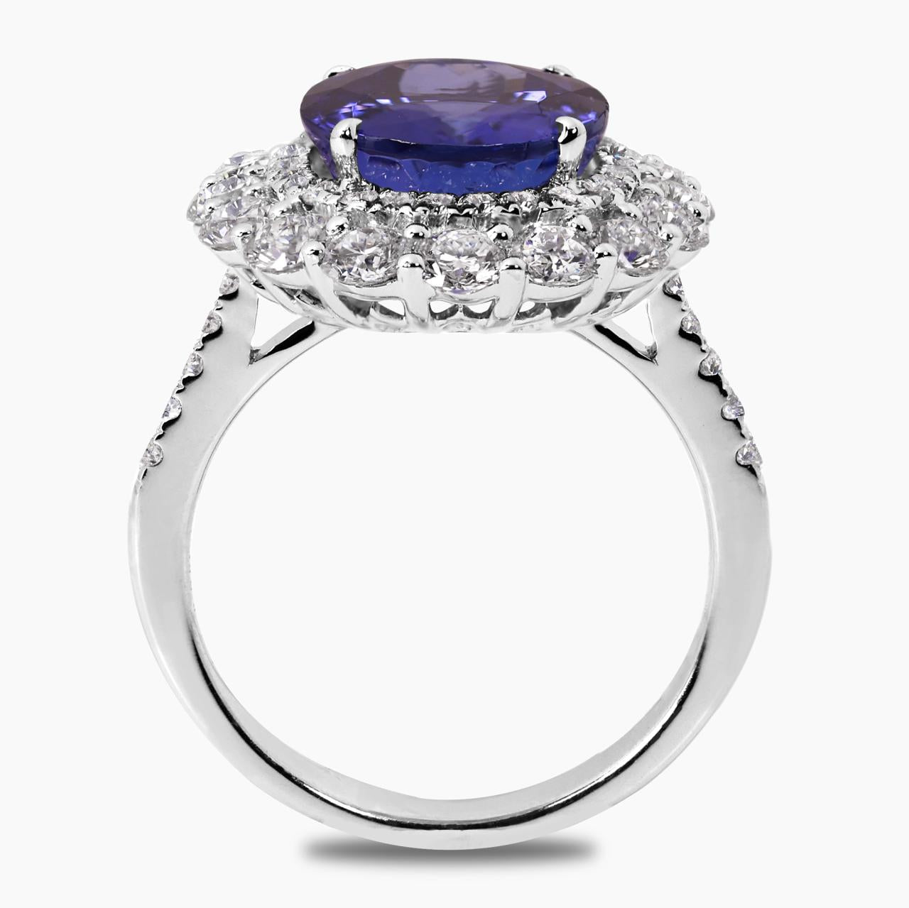 18ct white gold tanzanite and round brilliant cut diamond claw set double halo ring