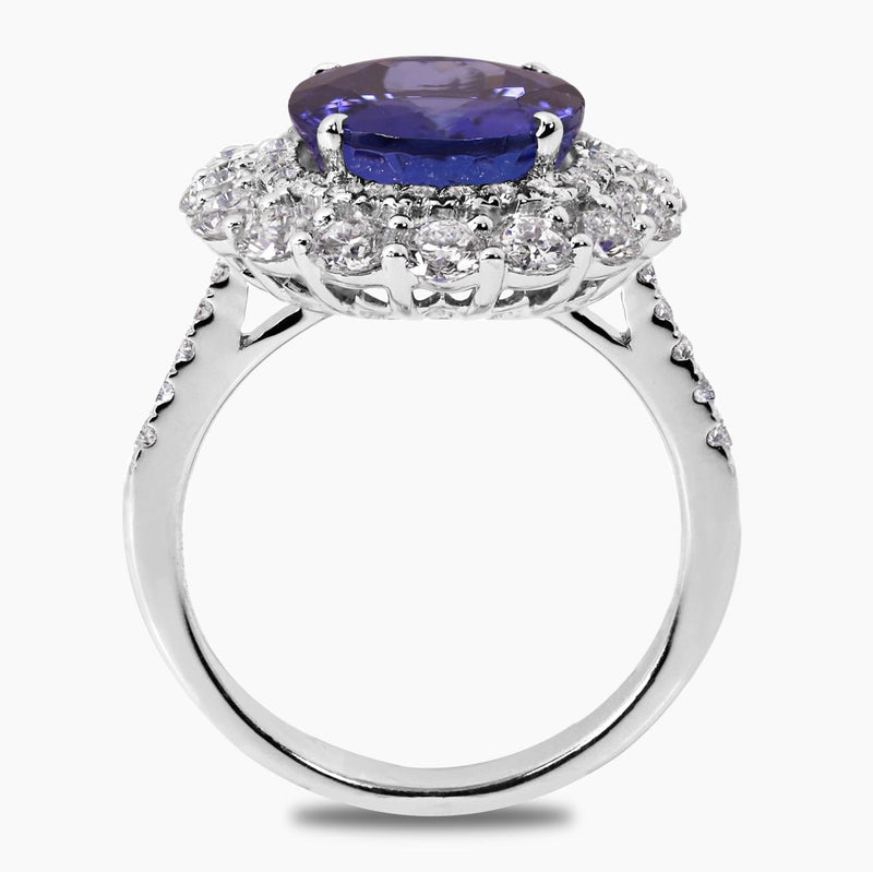 18ct white gold tanzanite and round brilliant cut diamond claw set double halo ring