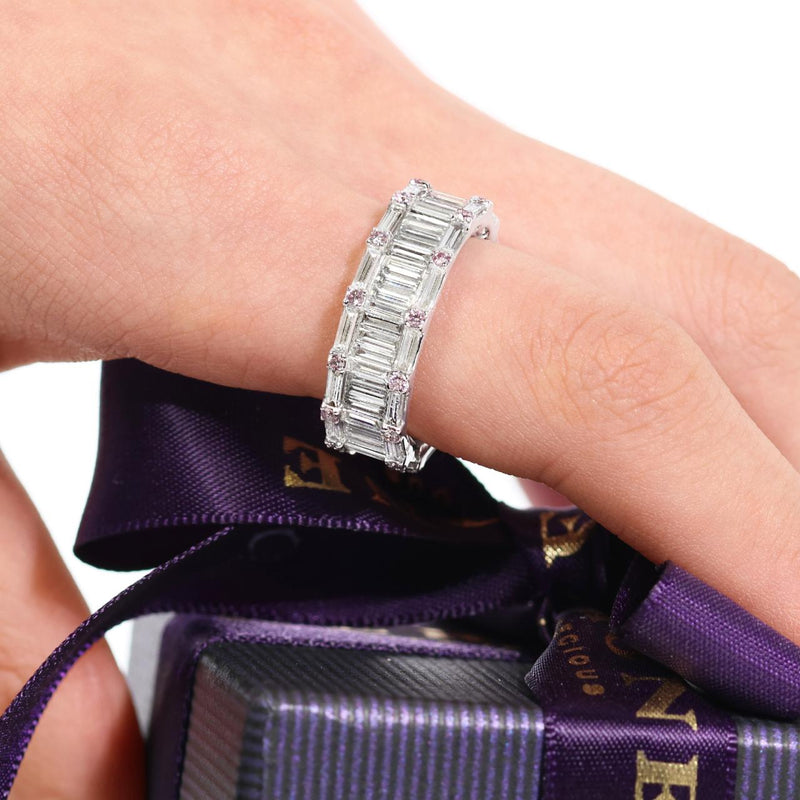 18ct white gold baguette and round brilliant cut Argyle Pink diamond ring on the finger